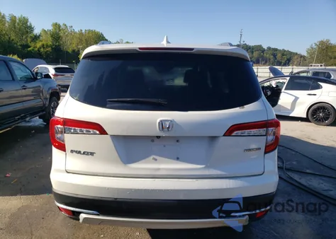 2019 Honda Pilot Touring z USA, uszkodzony, nr VIN 5FNYF5H6XKB037214
